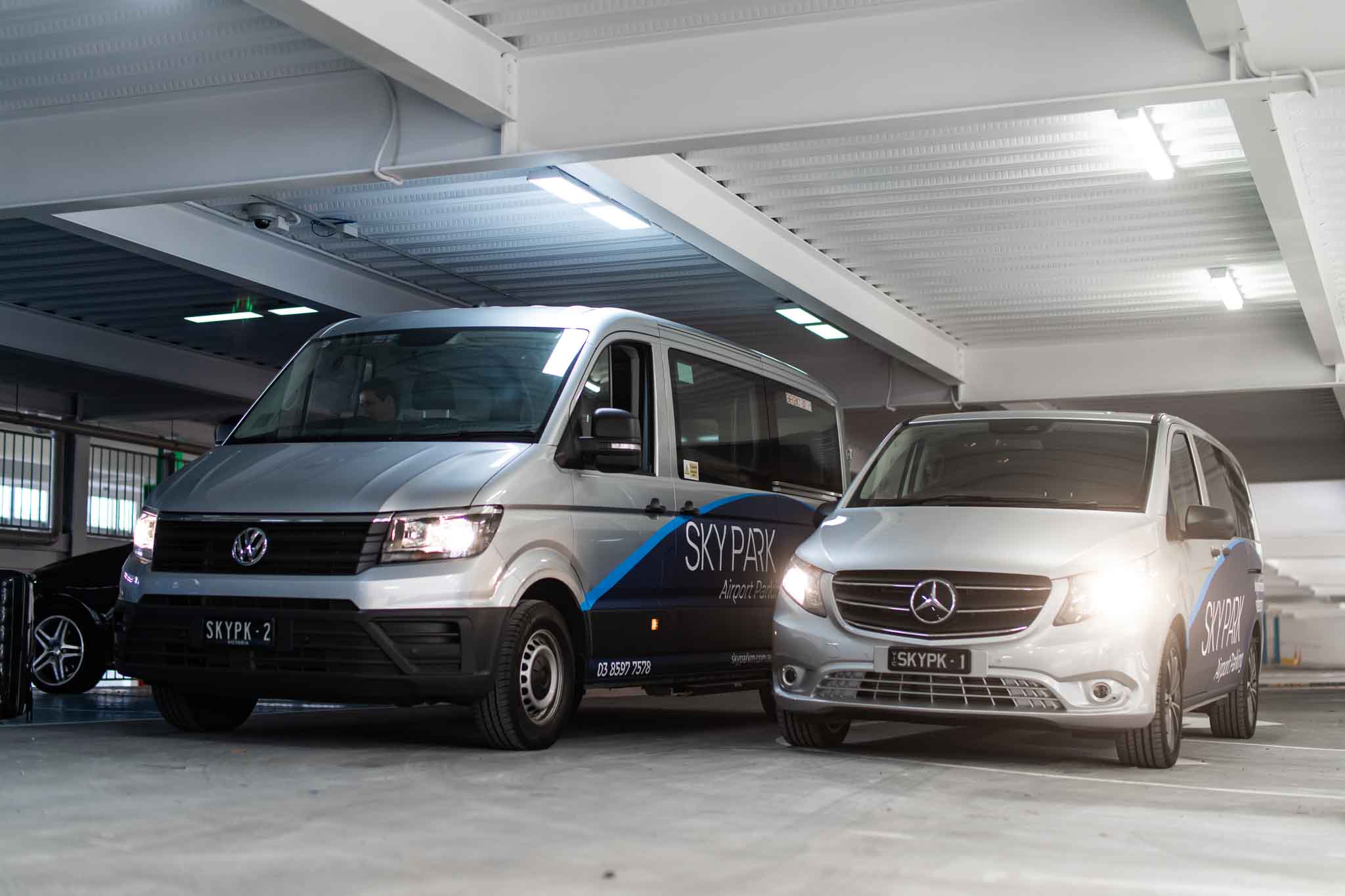 SkyPark Melbourne Airport Shuttles next to each other